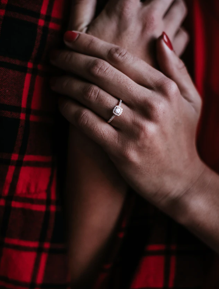 hands of a man and woman engaged