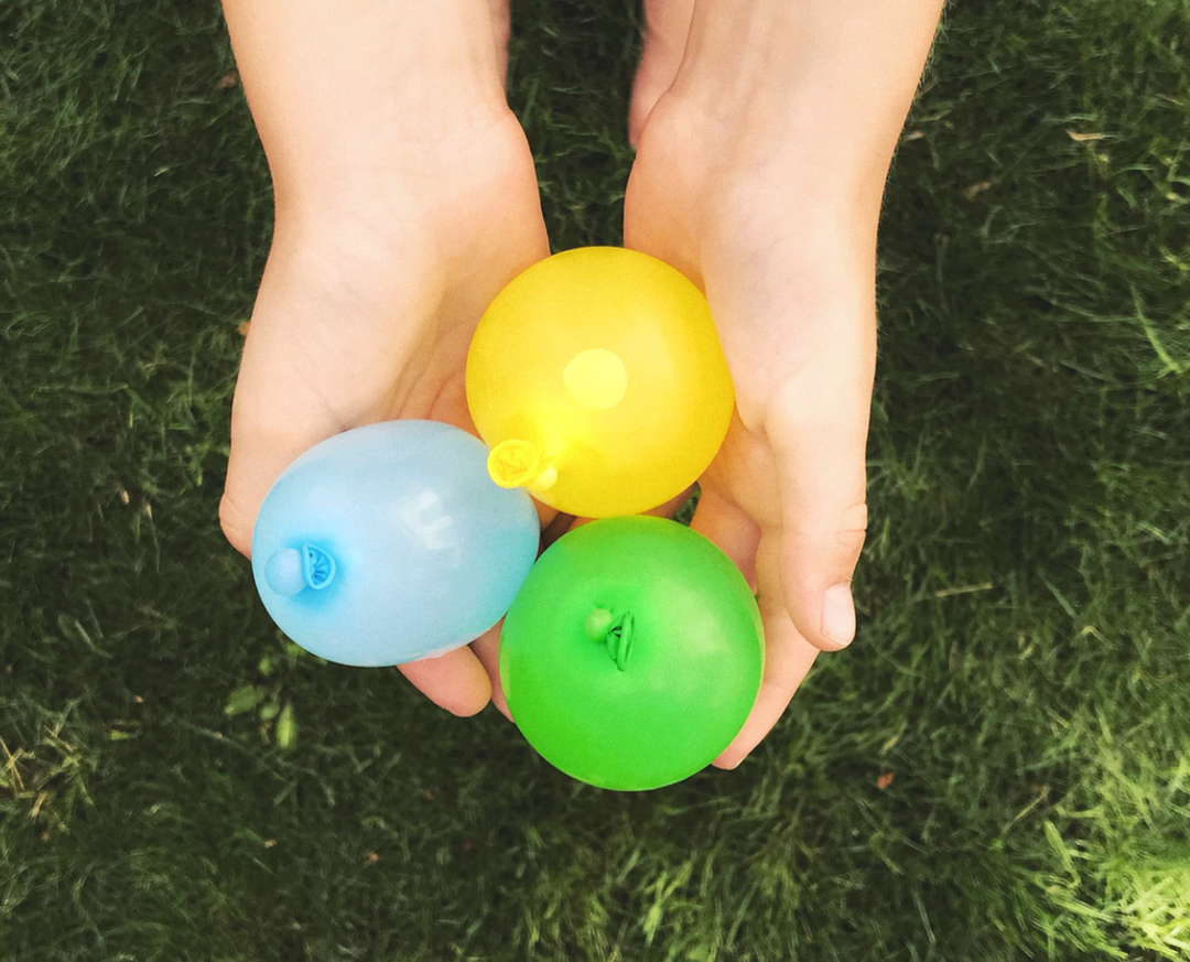 Water balloons in kids hands