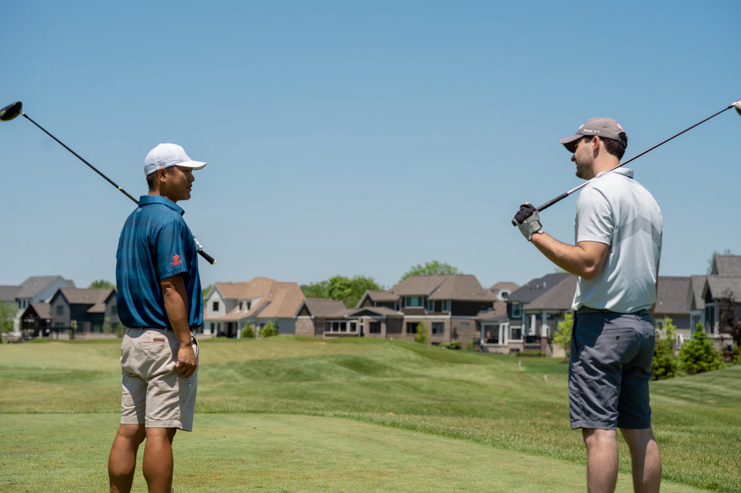 two-golf-players-keeping-distance