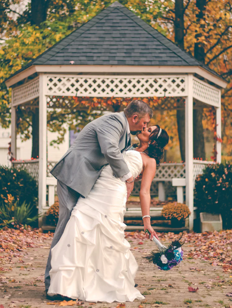 bride-groom-kissing-fall